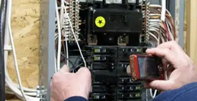 Home electrical inspection of circuit breaker panel by licensed electrician in Saint Petersburg, FL