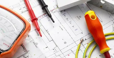 licensed electrician planning and testing electrical systems using professional tools in Saint Petersburg, FL