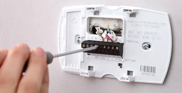 Thermostat installation service with proper wiring and secure wall mounting in Saint Petersburg, FL